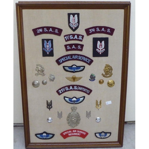 232 - Five framed displays of replica medals and fabric badges (Please Note: this lot is subject to the st... 