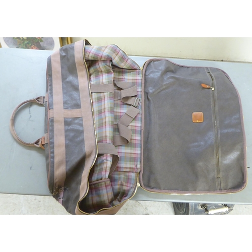 234 - Three items of Mulberry hand luggage 