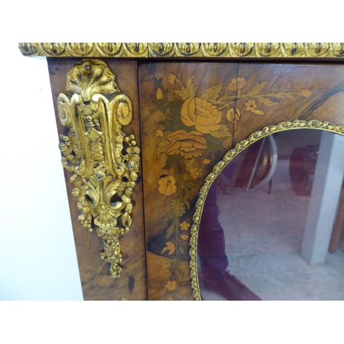 237 - A late Victorian walnut and floral marquetry pier cabinet with ormolu gilt mounts, the glazed door e... 