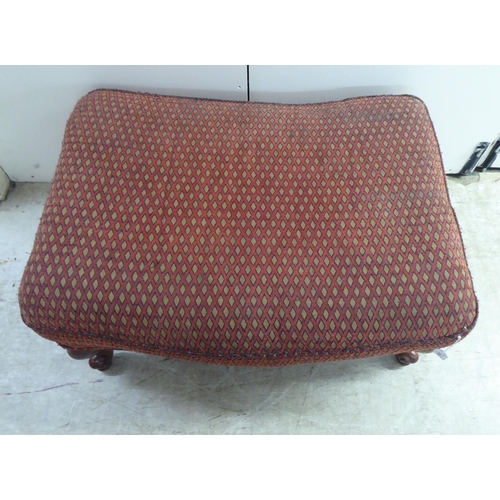 256 - A modern diamond formation pattern fabric upholstered footstool, raised on cabriole legs 