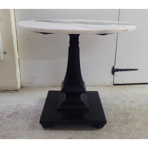 263 - A modern pedestal table with a drop-in marble top  23.5