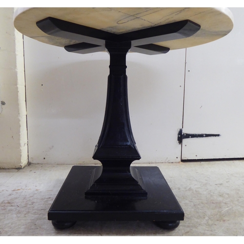 263 - A modern pedestal table with a drop-in marble top  23.5