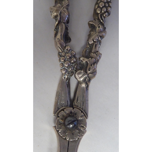 36 - A pair of Victorian silver grape scissors  George W Adams  London  (date letter obscu... 