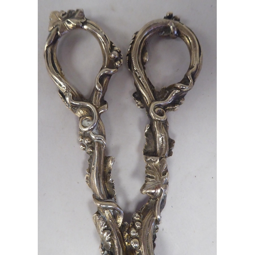 36 - A pair of Victorian silver grape scissors  George W Adams  London  (date letter obscu... 