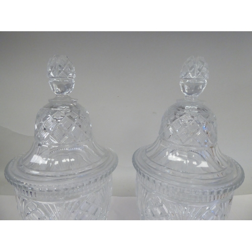 38 - A pair of hobnail cut and slice decorated, pedestal vase design glass sweet jars with domed covers a... 