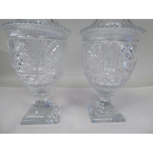 38 - A pair of hobnail cut and slice decorated, pedestal vase design glass sweet jars with domed covers a... 