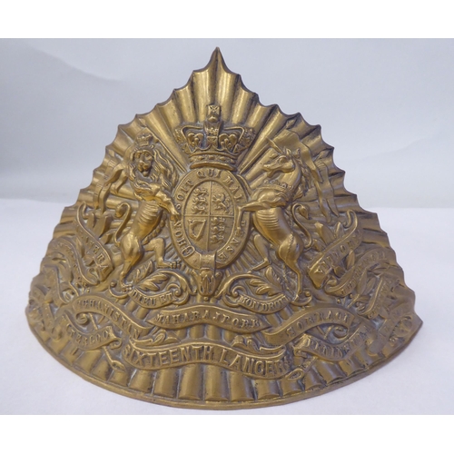 49 - A Sixth and a Seventeenth Lancers helmet plate(Please Note: this lot is subject to the statement mad... 