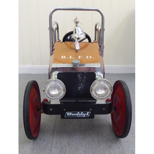 6 - A Duddy painted model pedal car, in the form of a fire truck with rubber wheels  37