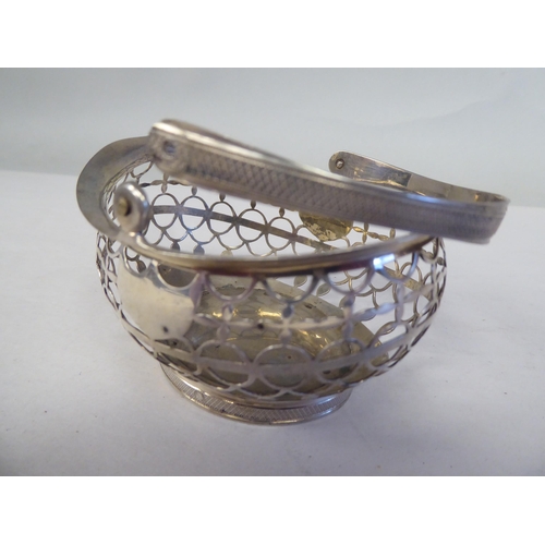 90 - Four similar 19thC Continental silver coloured metal miniature sweet baskets with variously ornament... 