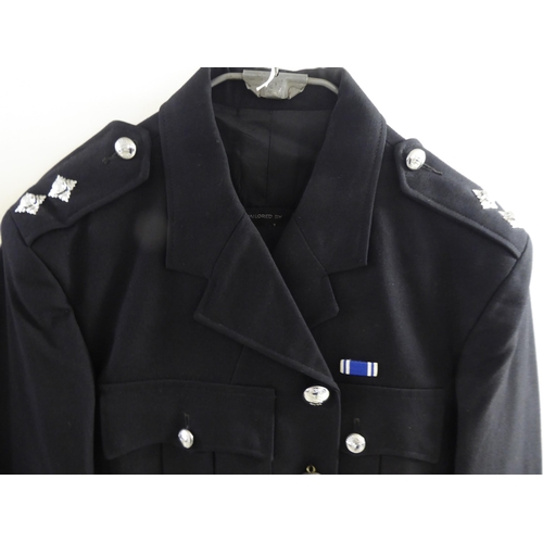 91 - Vintage British Police uniform tunics: to include Essex Constabulary