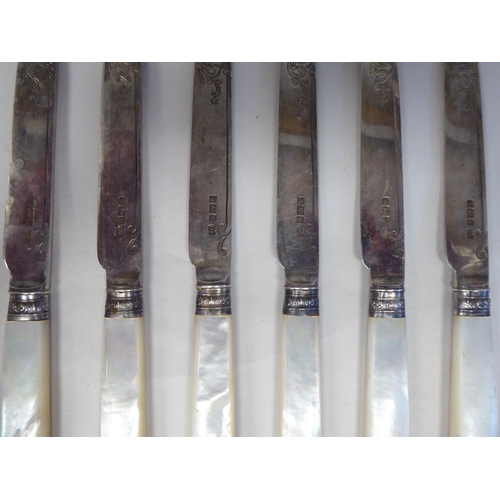 94 - A set of six Edwardian foliate engraved scrolled silver tea knives, on abalone handles    Sheffield ... 