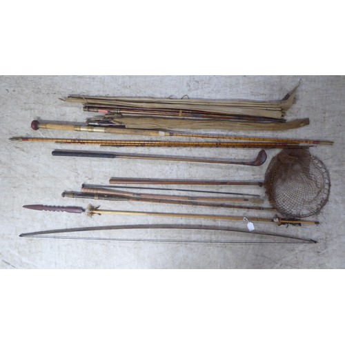 262 - A spear; a longbow; and fishing rods