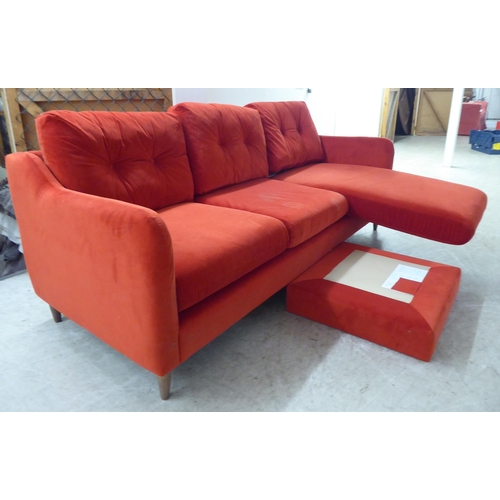 245 - A modern three person settee, upholstered in bright red fabric, raised on pegged feet  82