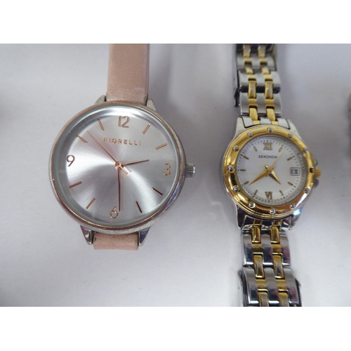 272 - Four ladies wristwatches: to include a Seiko, faced by a Roman dial 