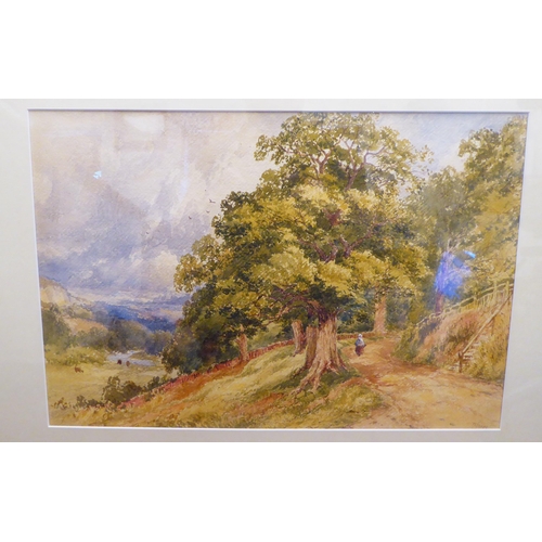 304 - T I Soper - a lone figure walking up a path in an open landscape  watercolour  bears a sig... 