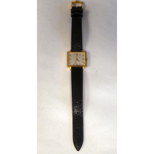 306 - An Omega gold plated and stainless steel cased wristwatch, the square baton dial, on a black hide sn... 