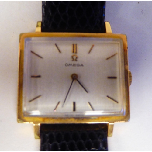 306 - An Omega gold plated and stainless steel cased wristwatch, the square baton dial, on a black hide sn... 