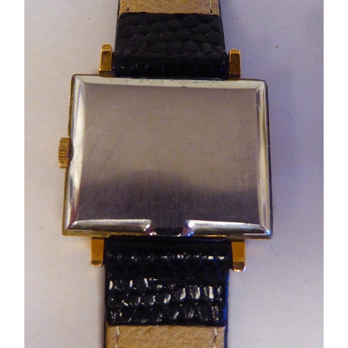 306 - An Omega gold plated and stainless steel cased wristwatch, the square baton dial, on a black hide sn... 