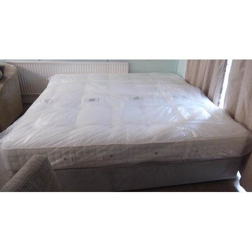 A Hypnos double divan bed base and a Signature mattress 70"w