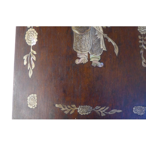 101 - A pair of Chinese hardwood panels, inlaid in engraved mother-of-pearl, depicting warriors bearing ar... 