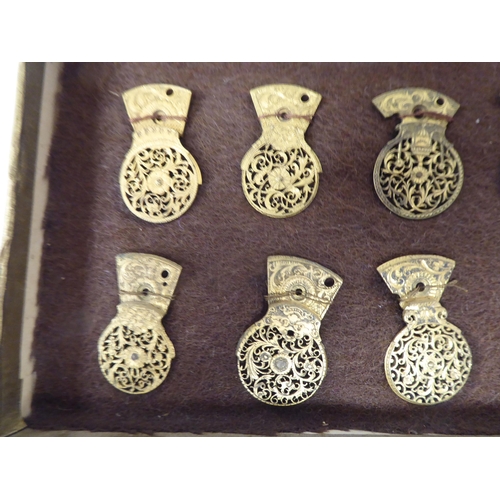 118 - A series of twelve 18th/19thC finely pierced and engraved gilt metal pocket watch balance cocks