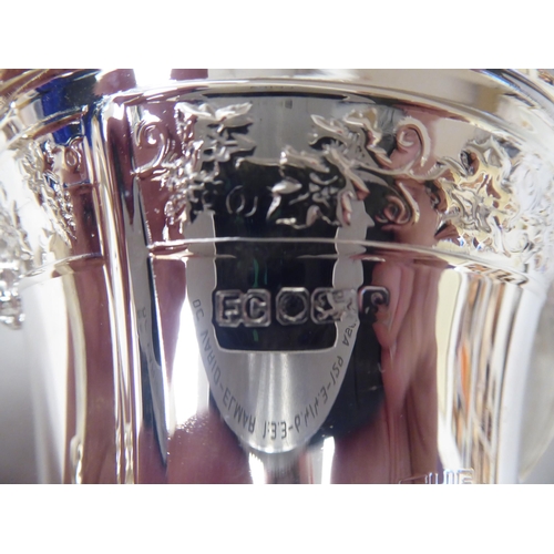 125 - A half-size silver replica of The Football Association Challenge Cup and cover with grape and vine d... 