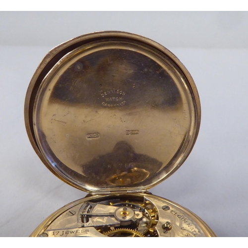 13 - A 9ct gold cased half-hunter pocket watch, the movement faced by a white enamel Roman dial, incorpor... 