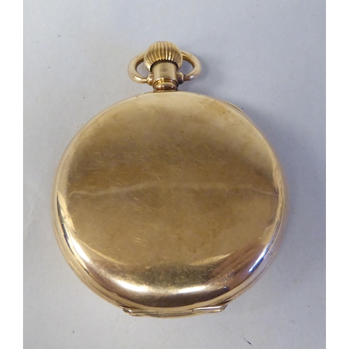 13 - A 9ct gold cased half-hunter pocket watch, the movement faced by a white enamel Roman dial, incorpor... 