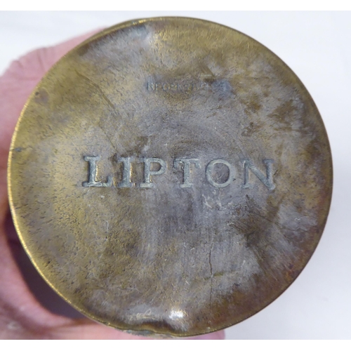 137 - Decorative and domestic metalware: to include a 1925 British Empire Exhibition brass Lipton's Tea ca... 