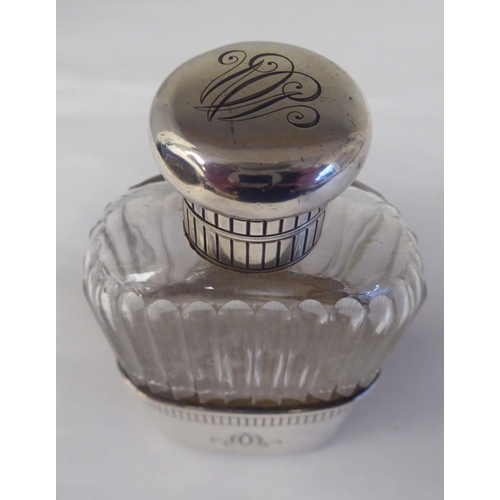 146 - A silver mounted, reed moulded glass hip flask with a detachable sleeve cup and outset hinged cap&nb... 