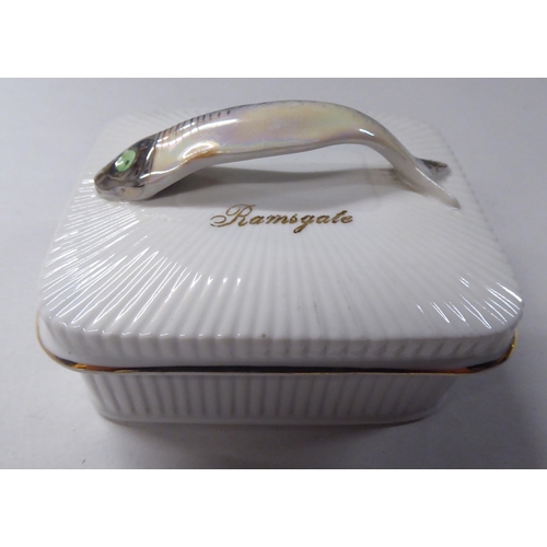 162 - Four dissimilar china table sardine boxes: to include one featuring a lobster handle, on scrolled fe... 