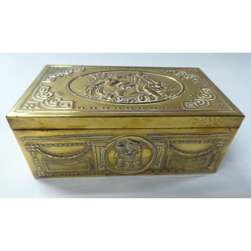 167 - A late 19thC cast gilded metal jewellery box, fashioned as a commode, the hinged lid enclosing a qui... 