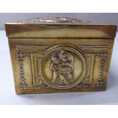 167 - A late 19thC cast gilded metal jewellery box, fashioned as a commode, the hinged lid enclosing a qui... 