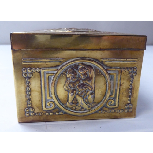 167 - A late 19thC cast gilded metal jewellery box, fashioned as a commode, the hinged lid enclosing a qui... 