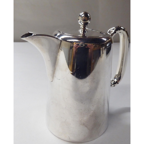 168 - A four piece EPNS coffee set of tapered form, comprising a coffee pot, hot water pot, twin handled s... 