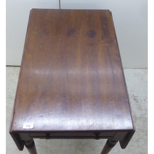 175 - A mid Victorian mahogany Pembroke table, raised on turned, tapered legs  29