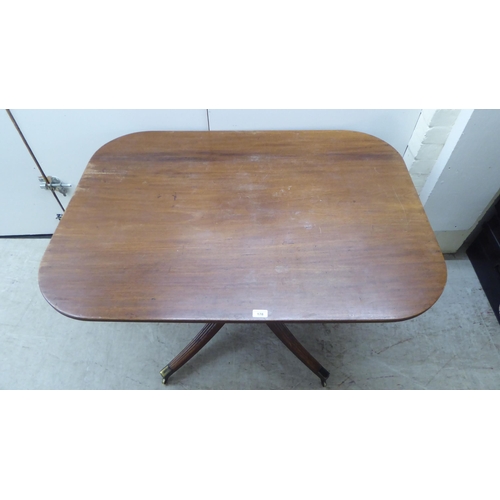 178 - A Regency mahogany single pedestal dining table, raised on splayed sabre legs and casters  28