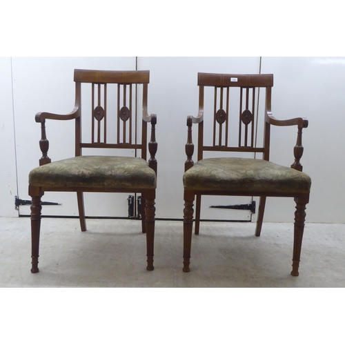 179 - A set of five Edwardian satinwood inlaid mahogany framed dining chairs, each with a splat-back and a... 