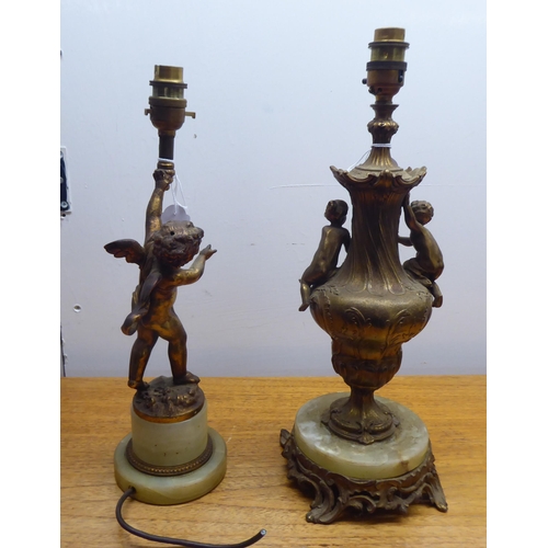 182 - Two mid 20thC gilt metal and onyx lamps, one shaped as a standing cherub  15