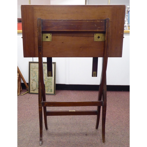 2 - An Edwardian satinwood string inlaid mahogany campaign design, folding card table, enclosing a brown... 