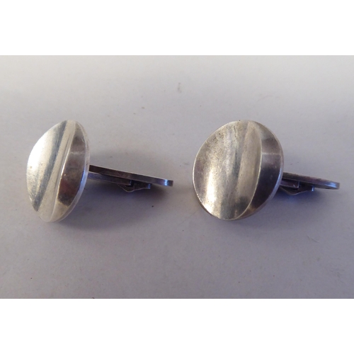 205 - A pair of silver coloured metal Georg Jensen cufflinks  stamped 925