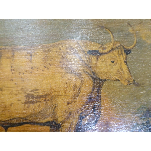 216 - Michael Benfield - a study of a bull standing in a field  oil on panel  bears a signature&... 