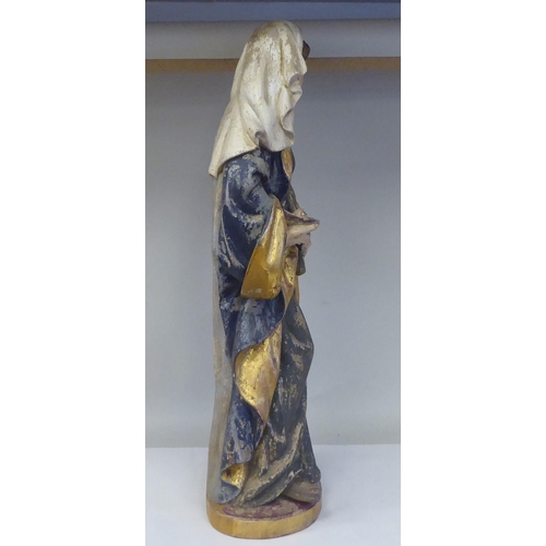 43 - A 19thC carved and painted wooden figure 'St Lucy Patron Saint of Sight and Sufferers of Eye Disease... 