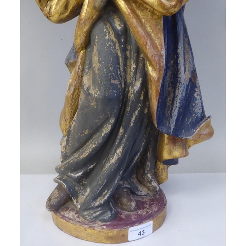 43 - A 19thC carved and painted wooden figure 'St Lucy Patron Saint of Sight and Sufferers of Eye Disease... 