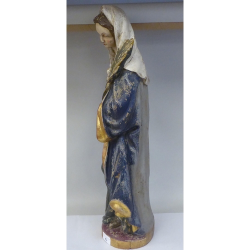 43 - A 19thC carved and painted wooden figure 'St Lucy Patron Saint of Sight and Sufferers of Eye Disease... 