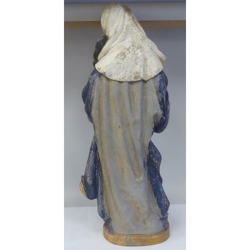 43 - A 19thC carved and painted wooden figure 'St Lucy Patron Saint of Sight and Sufferers of Eye Disease... 