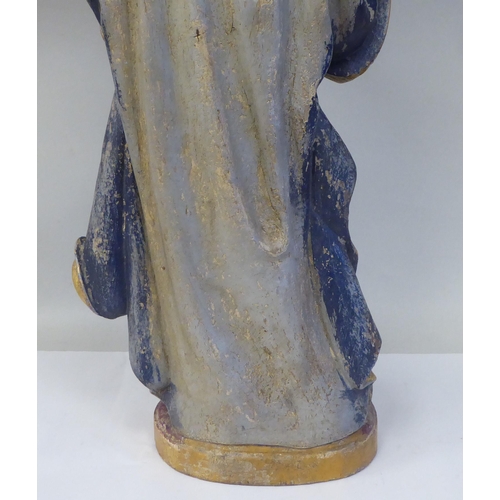 43 - A 19thC carved and painted wooden figure 'St Lucy Patron Saint of Sight and Sufferers of Eye Disease... 