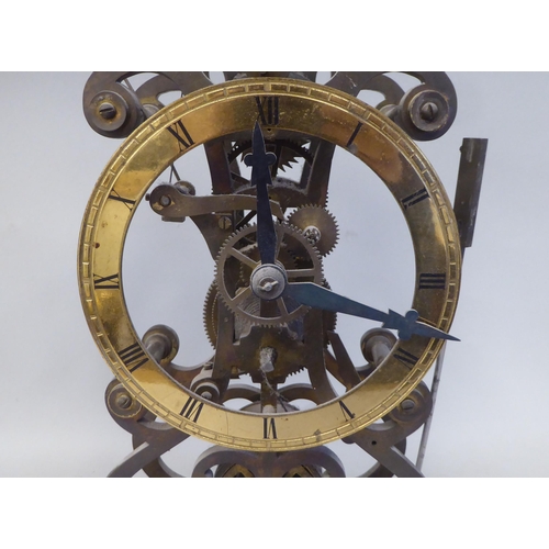 50 - A traditional brass framed skeleton clock, reputed to have been made by Roxroth Apprentices 1985; th... 