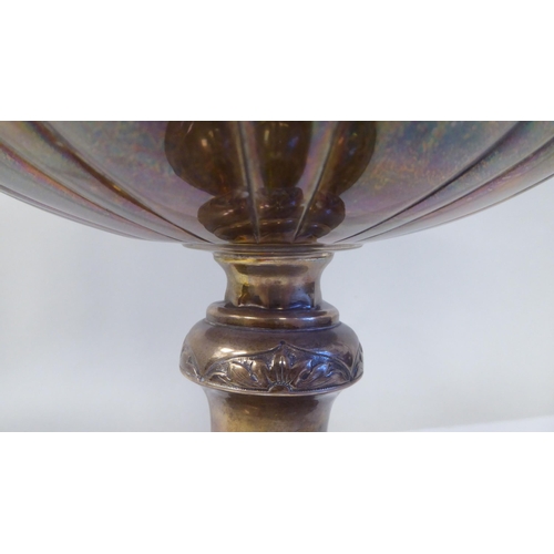 53 - A late 19thC silver Bulawayo Rifle Club trophy cup of pedestal form with twin handles, cast and chas... 