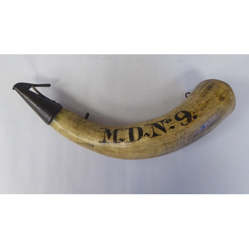 59 - A powder horn with an applied metal dispensing mechanism, inscribed MD No.9  12